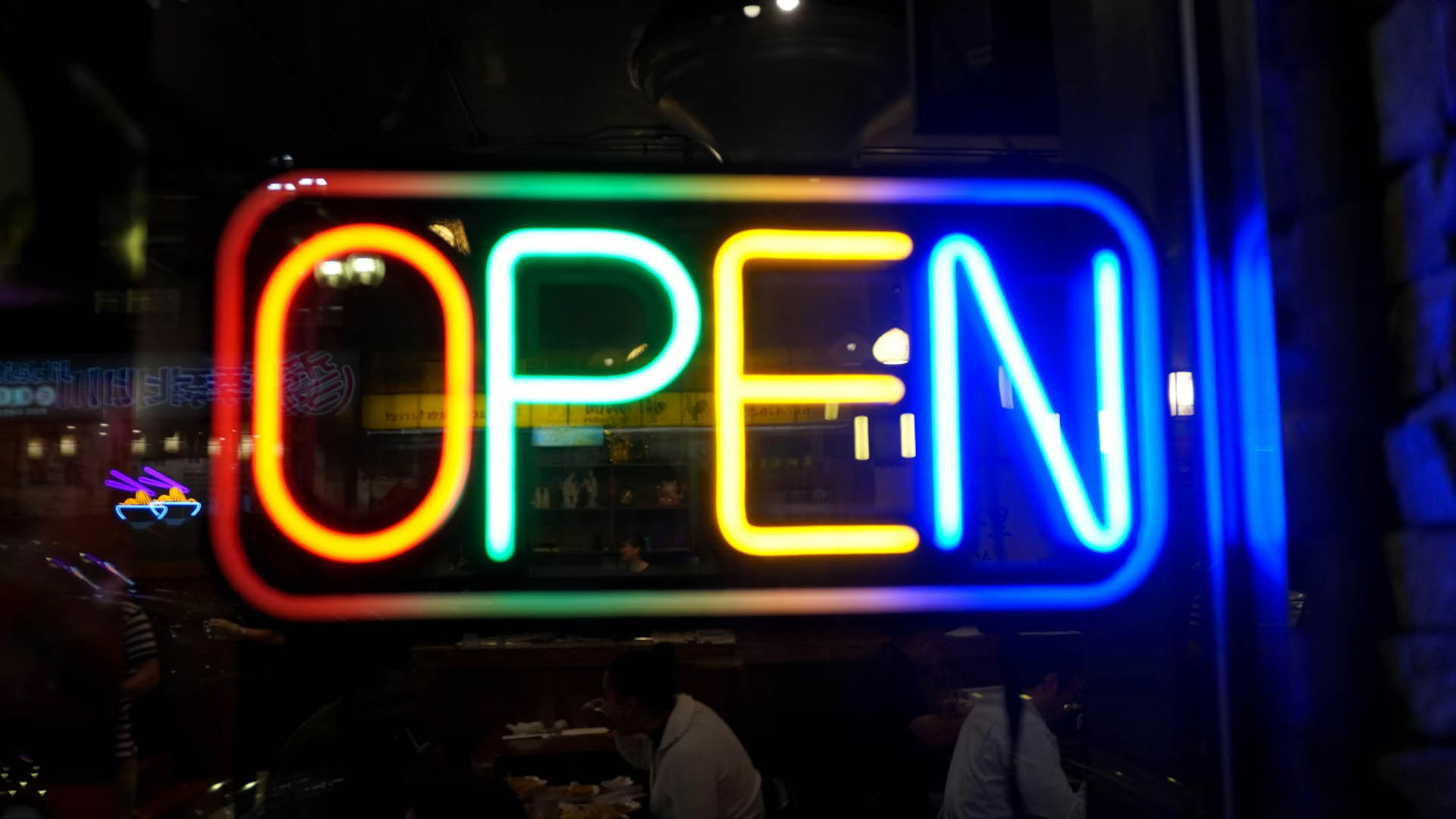 Neon open sign in a window